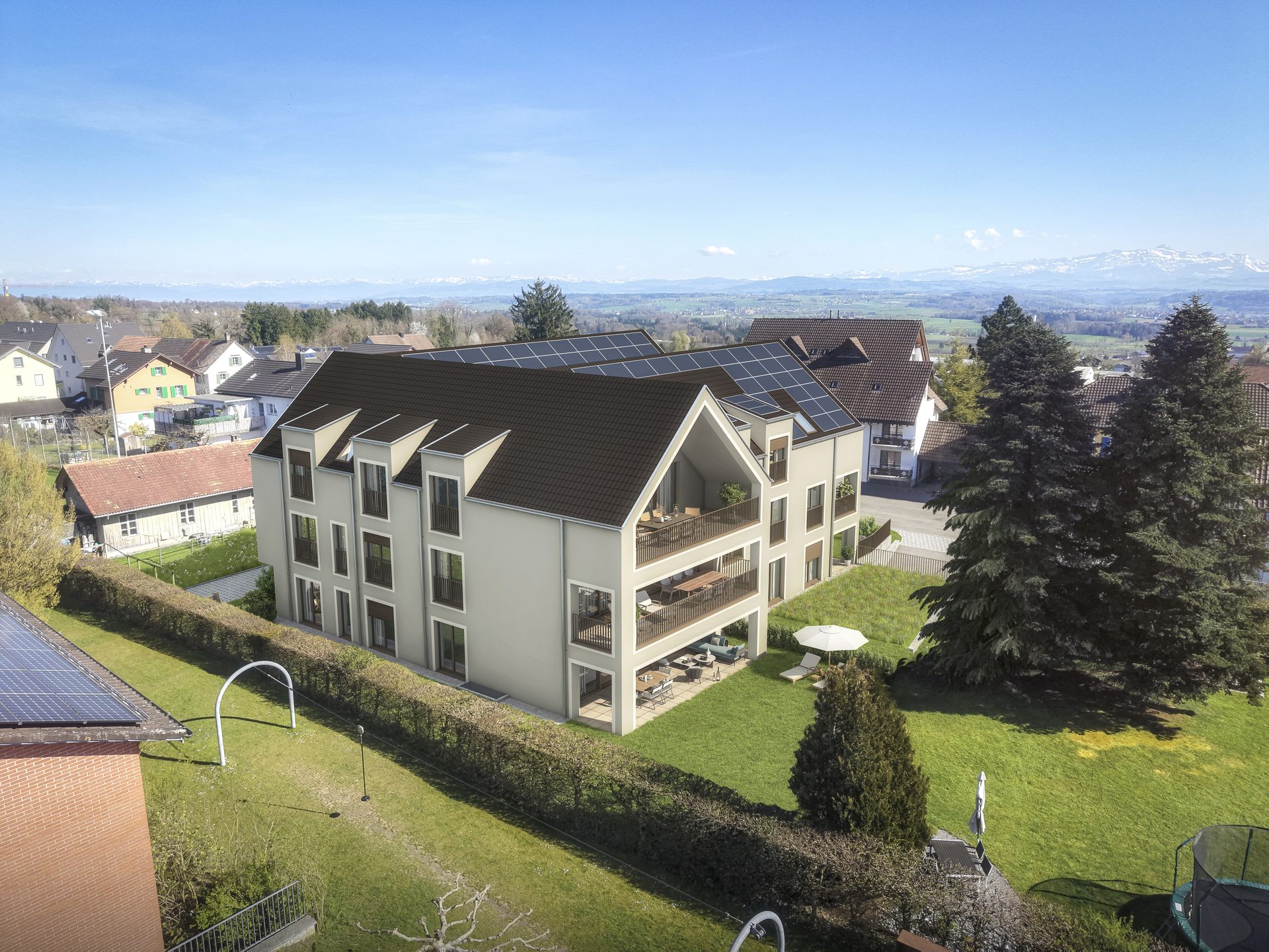 Luftbild des CURIA Neubaus in Berg TG mit Garten und Weitsicht Richtung Alpen